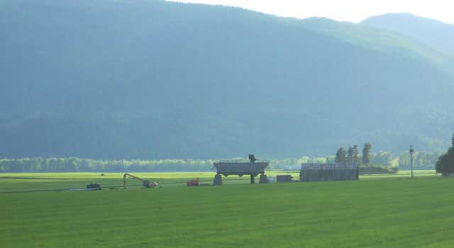 The verdant fields in the Kootenai River Valley reveal how plenty of moisture leads to big-volume crops and three full cuttings of hay